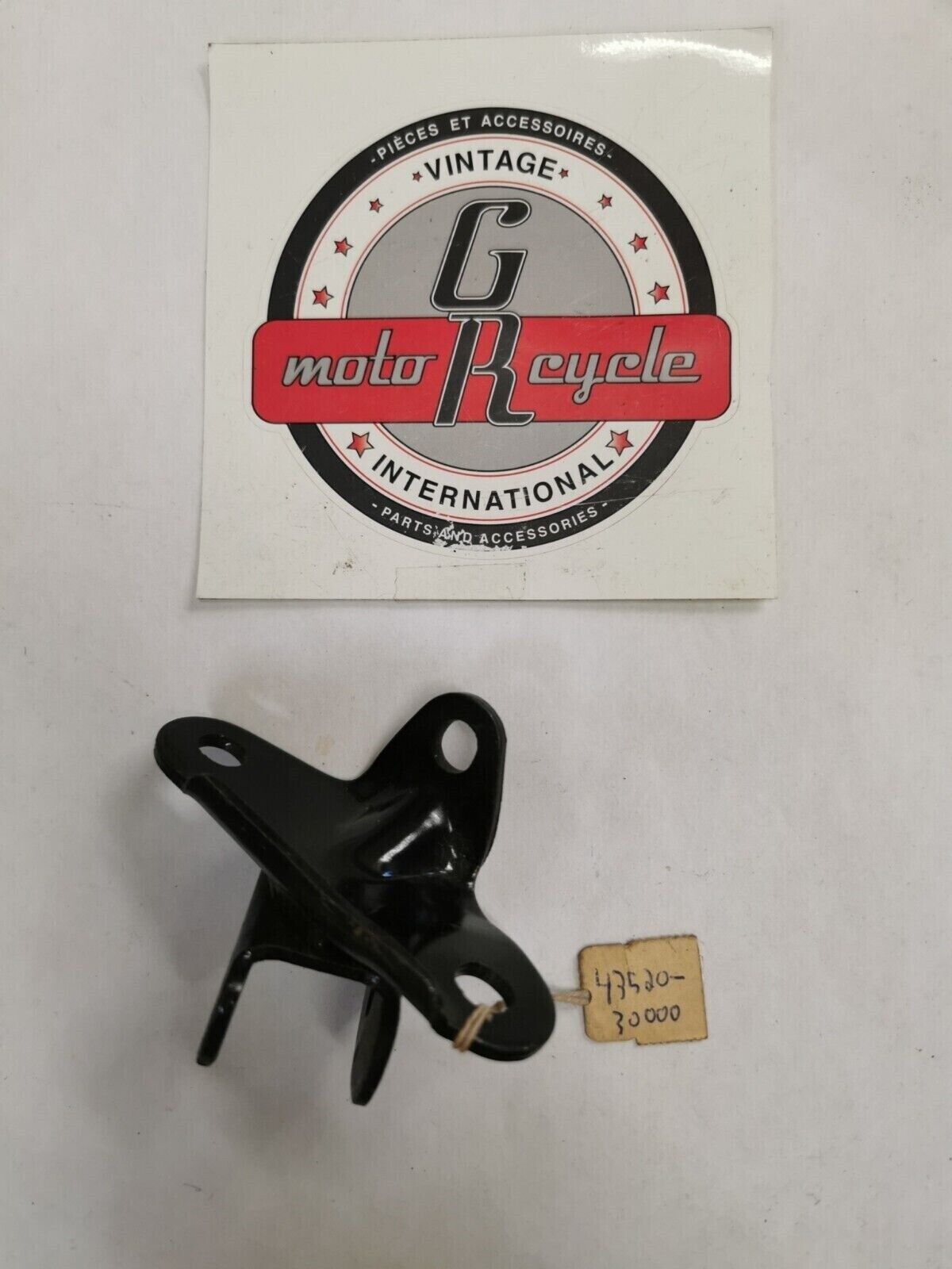 NOS SUZUKI TS250 1971  1972 HOLDER FOOTREST LH 43520-30000 S24