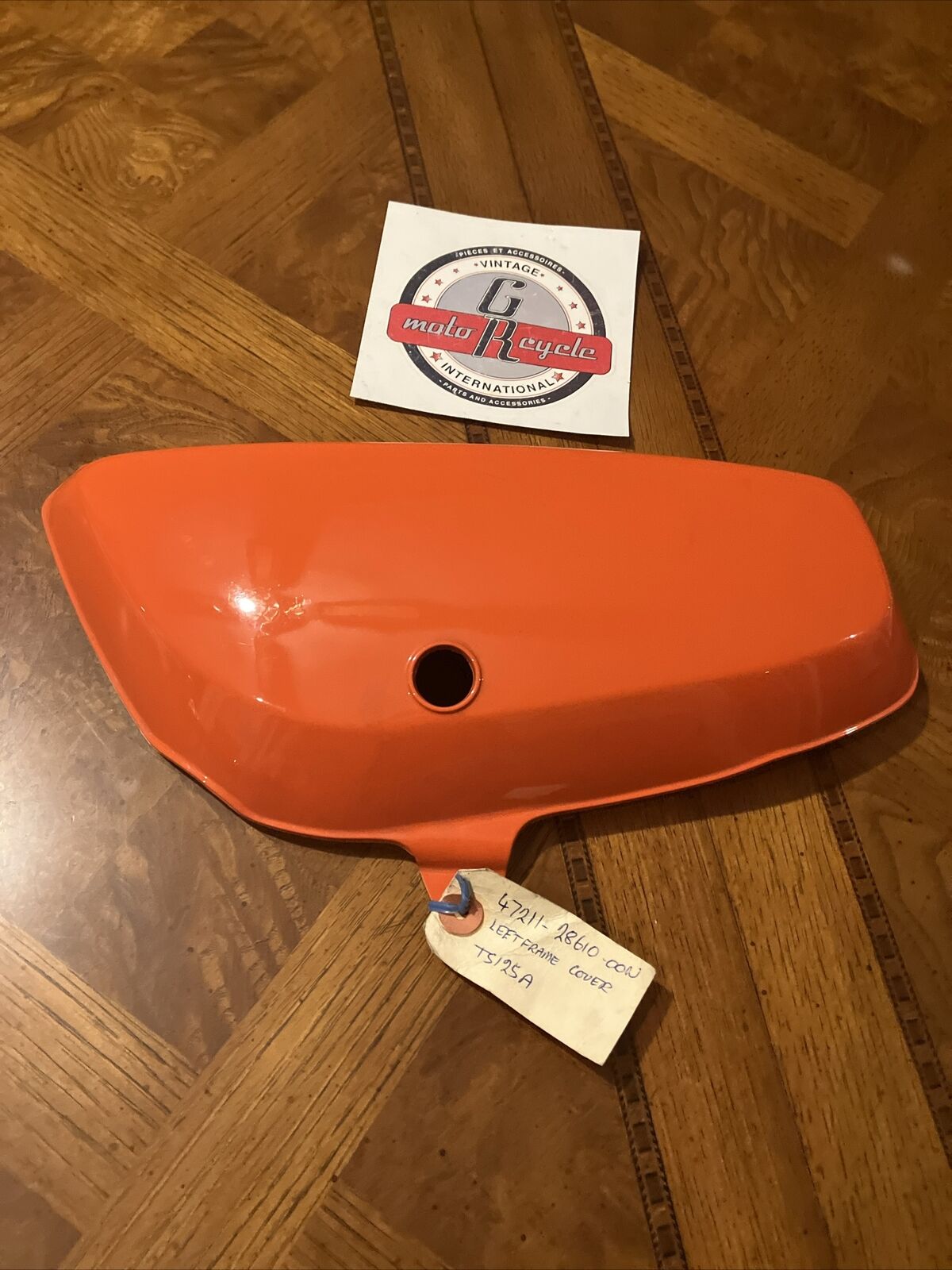 NOS Suzuki TS125 A 1976 LEFT SIDE COVER PANEL 47211-28610-00N S34