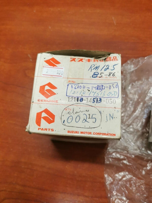 NOS SUZUKI 1985 1986 RM125 PISTON RING KIT 12103-14850-050 - 12110-14513-050 S30