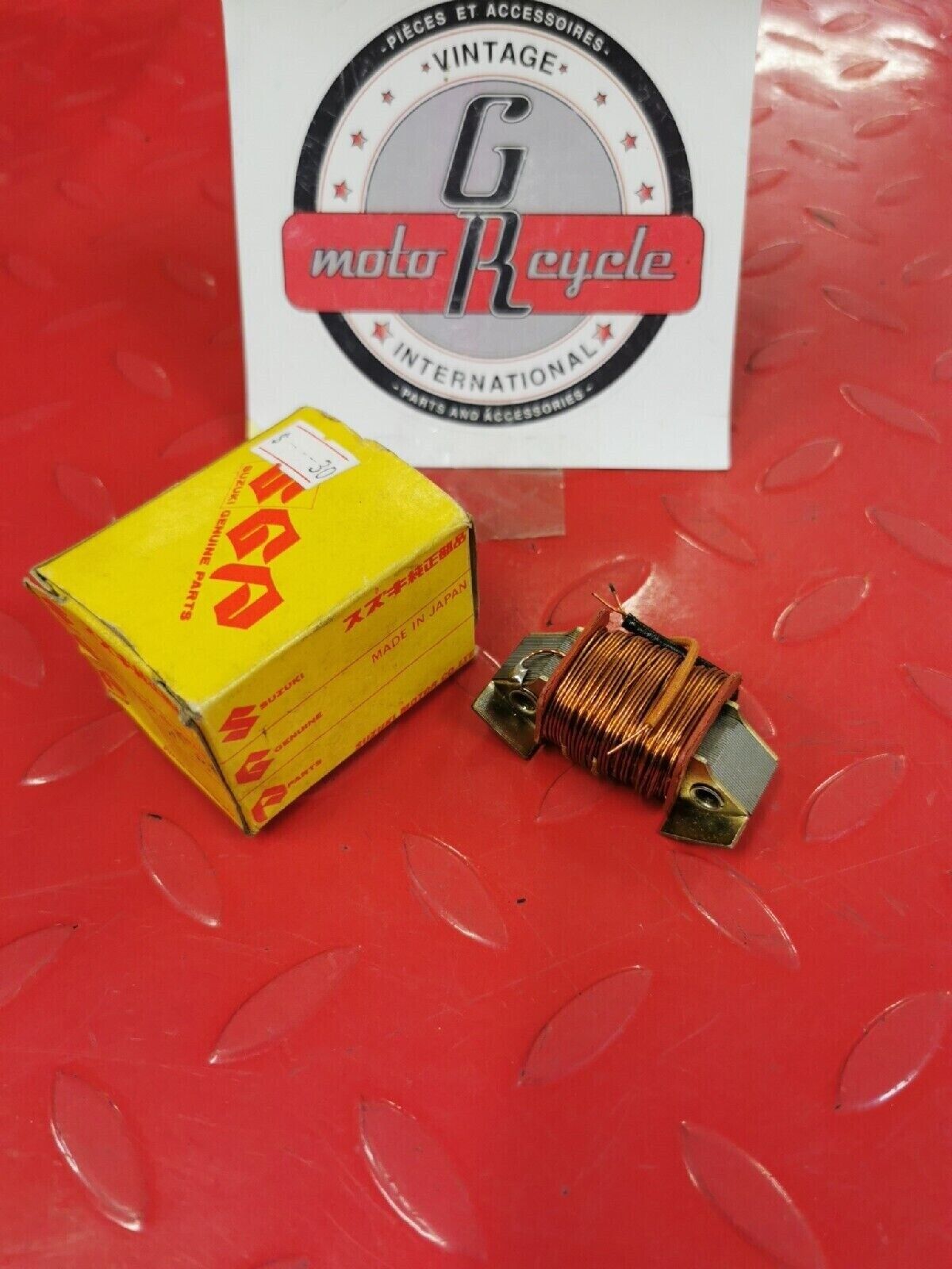 NOS SUZUKI TC100 1973 - 1975  COIL LIGHTING B  32130-25611 S12