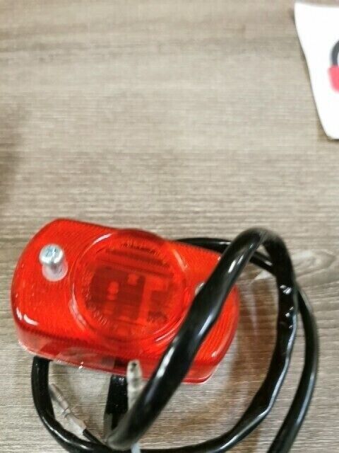 NOS SUZUKI DR370 DS100 DS125 LAMP ASSEMBLY REAR COMBINATION 35710-46410 S49