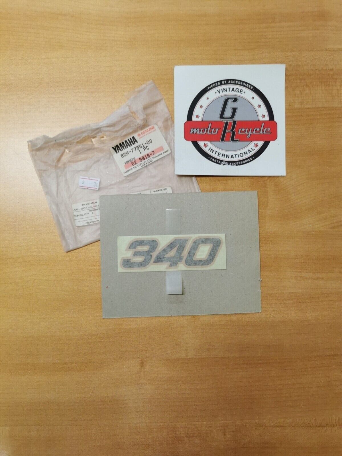 NOS YAMAHA 340 1987 EMBLEM 1 82H-77351-00-00 Y49
