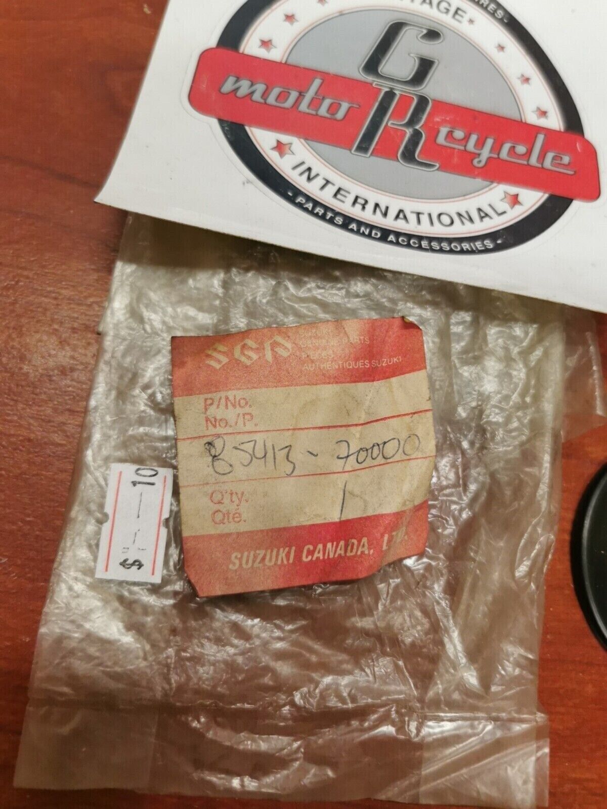NOS Suzuki TC100 DS80 GT185 TS100 GS400 FUEL TANK CAP GUIDE 85413-70000 S17