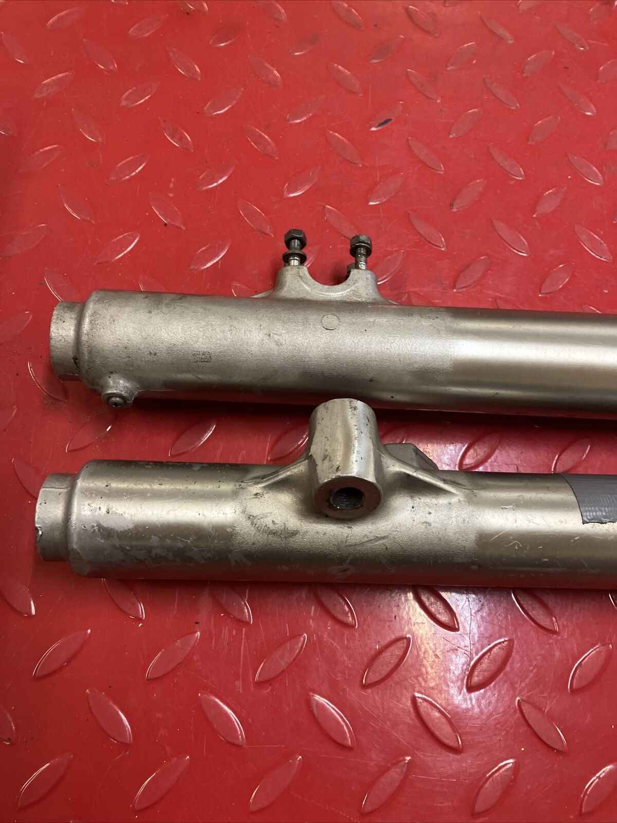 Honda CR125R 1981 left right front forks