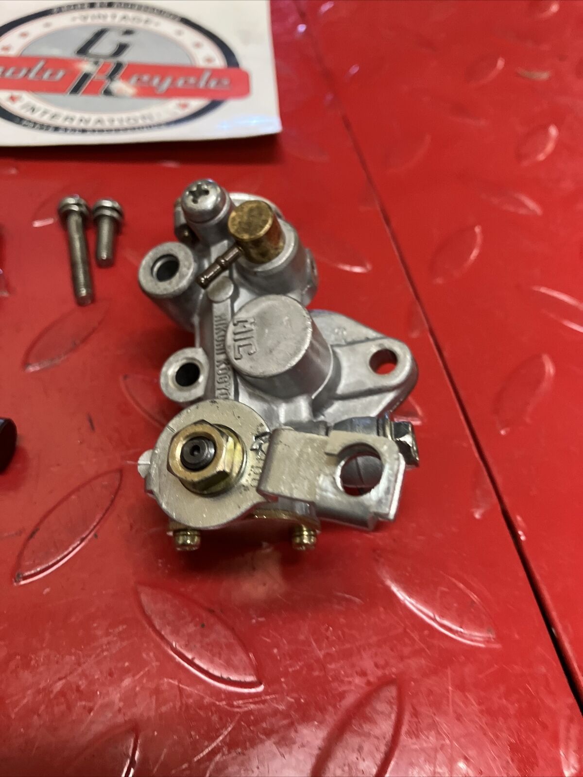 Suzuki DS100 1978 oil pump assembly gear cover shaft