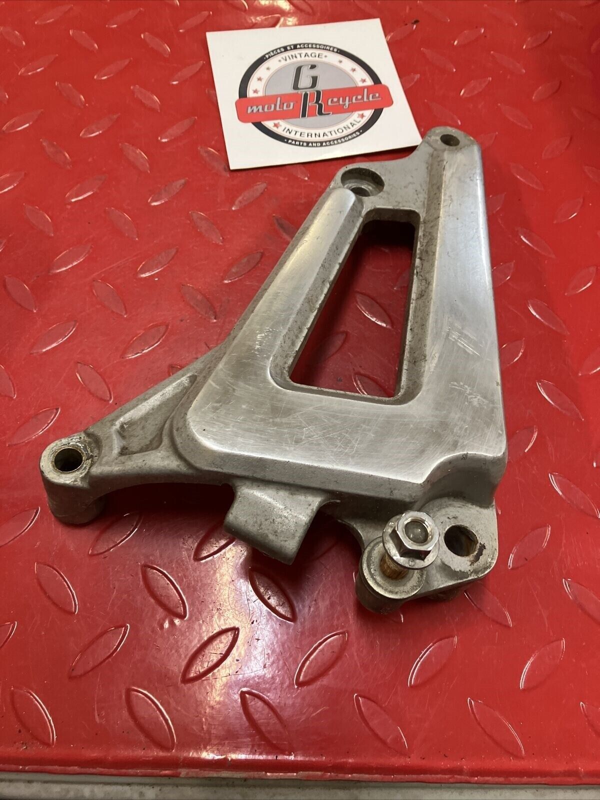 Yamaha XV500 Virago 500 left muffler silencer bracket footpeg holder mount