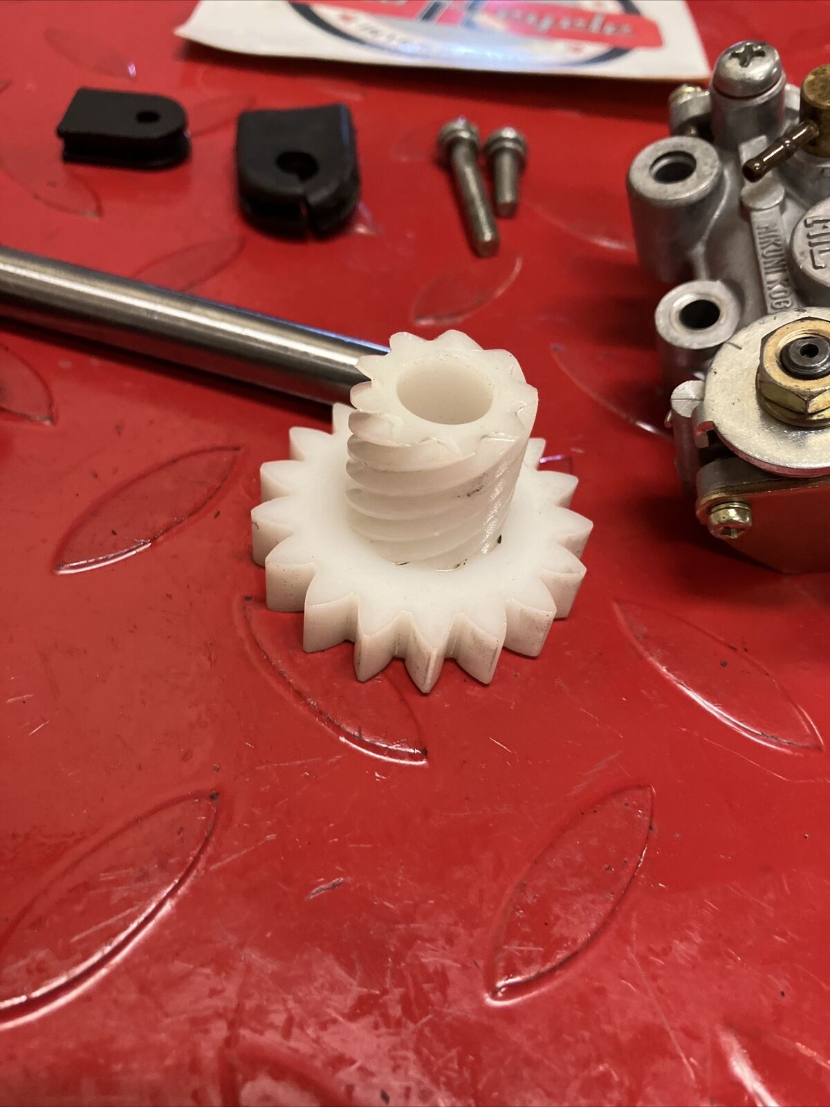 Suzuki DS100 1978 oil pump assembly gear cover shaft