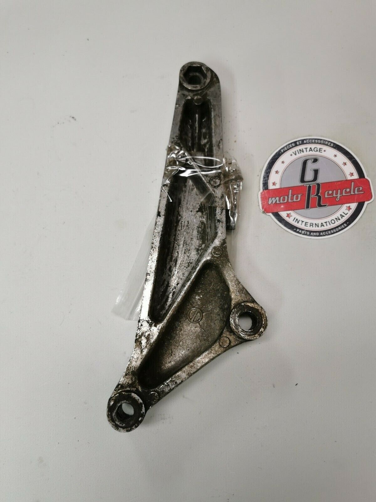 Honda CB750F 1978 left muffler holder rear footpeg foot peg bracket 1977