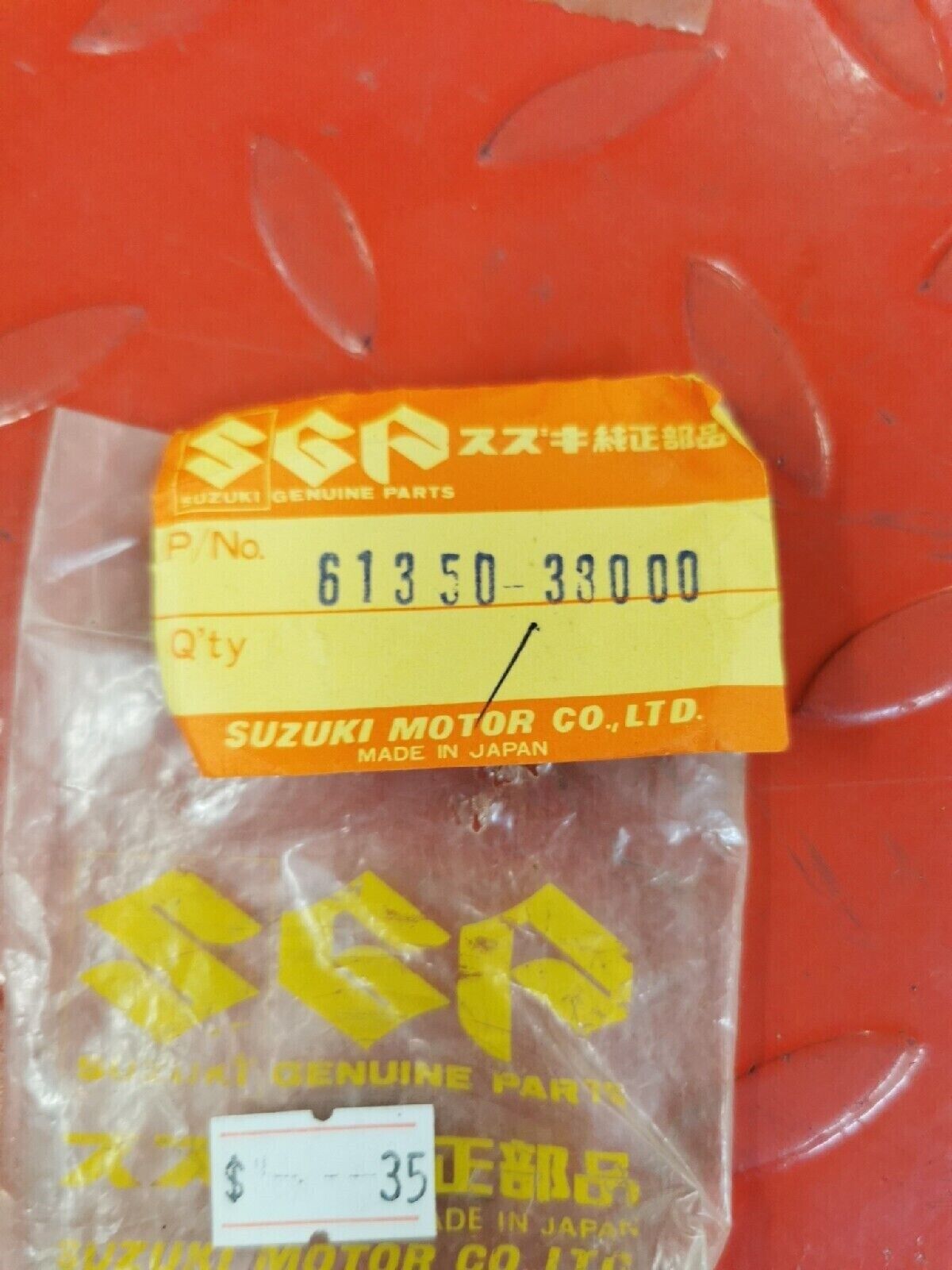 NOS SUZUKI RUBBER DAMPER 61350-33000   S12