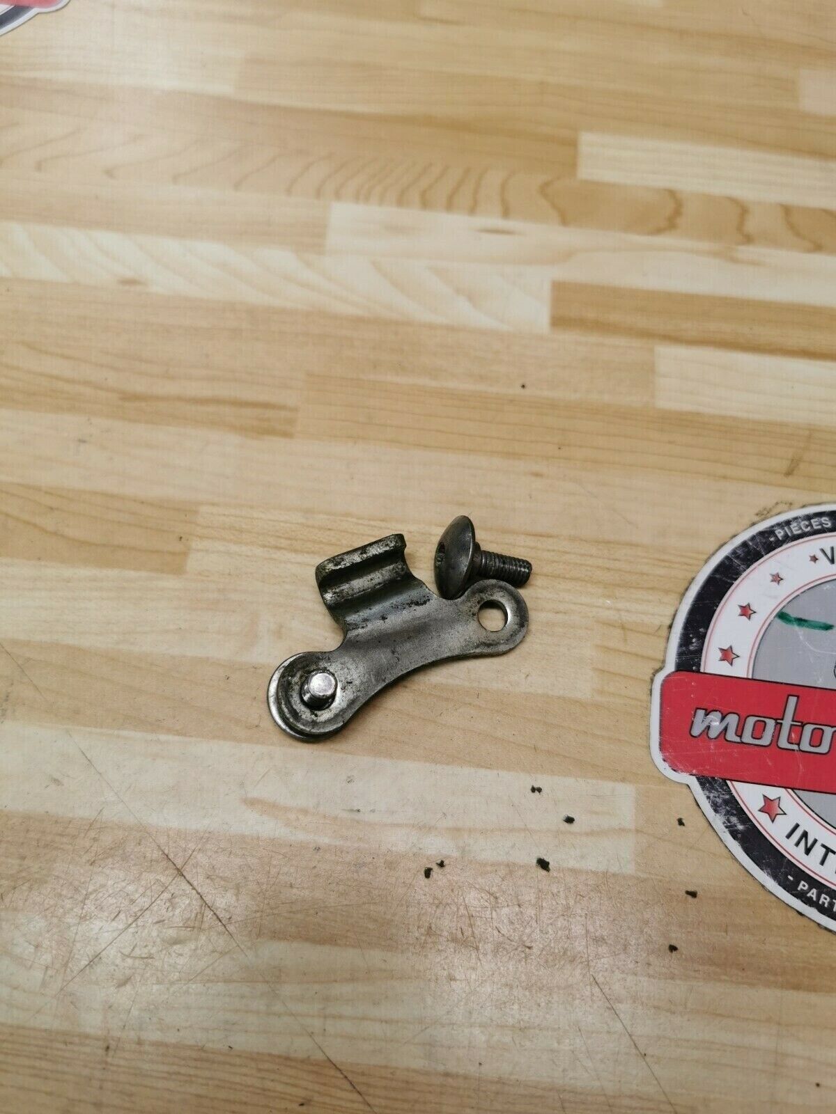 Suzuki RMZ450 2006 fuel tank band strap mounting hook bracket