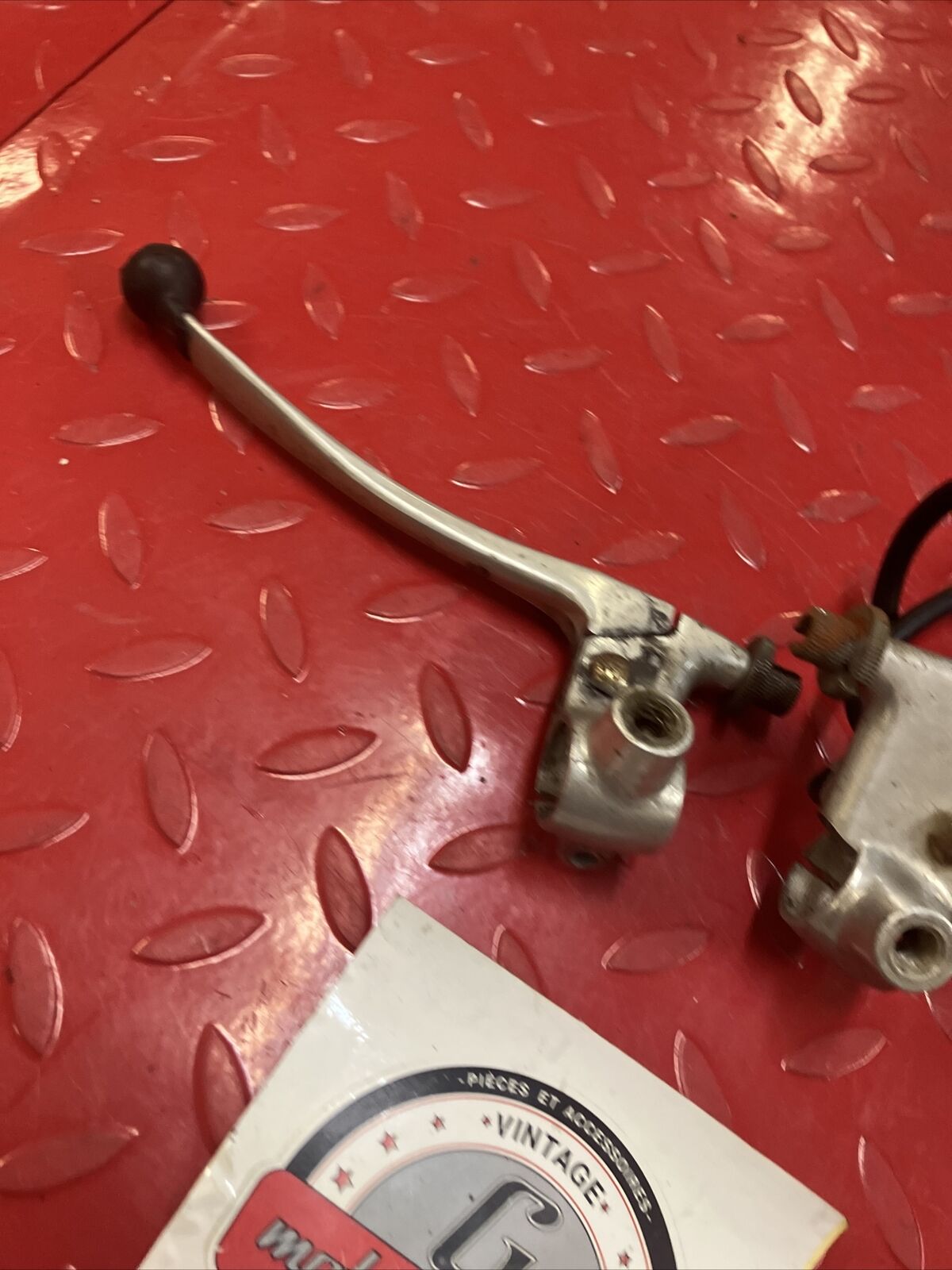 Suzuki RV90 1976 left and right handle lever clutch brake perch 57300-28012