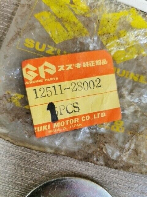 NOS SUZUKI RV125 RV125 TC125 TM100 PLATE CRANKSHAFT OIL GUIDE 12511-28002 S54