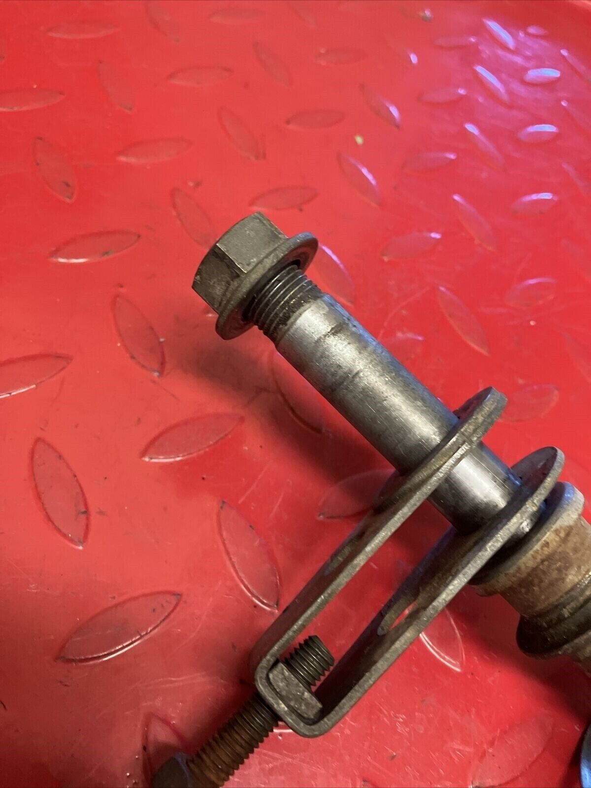 Kawasaki KX125 1980 rear wheel axle bolt shaft spacer collar chain adjuster