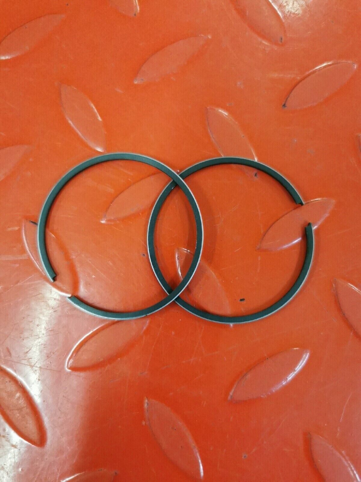 NOS SUZUKI RING SET PISTON OS 0.5 12140-36770 SUPERSEDED BY 12140-46000-050 S11