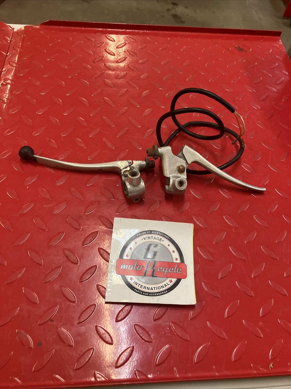 Suzuki RV90 1976 left and right handle lever clutch brake perch 57300-28012