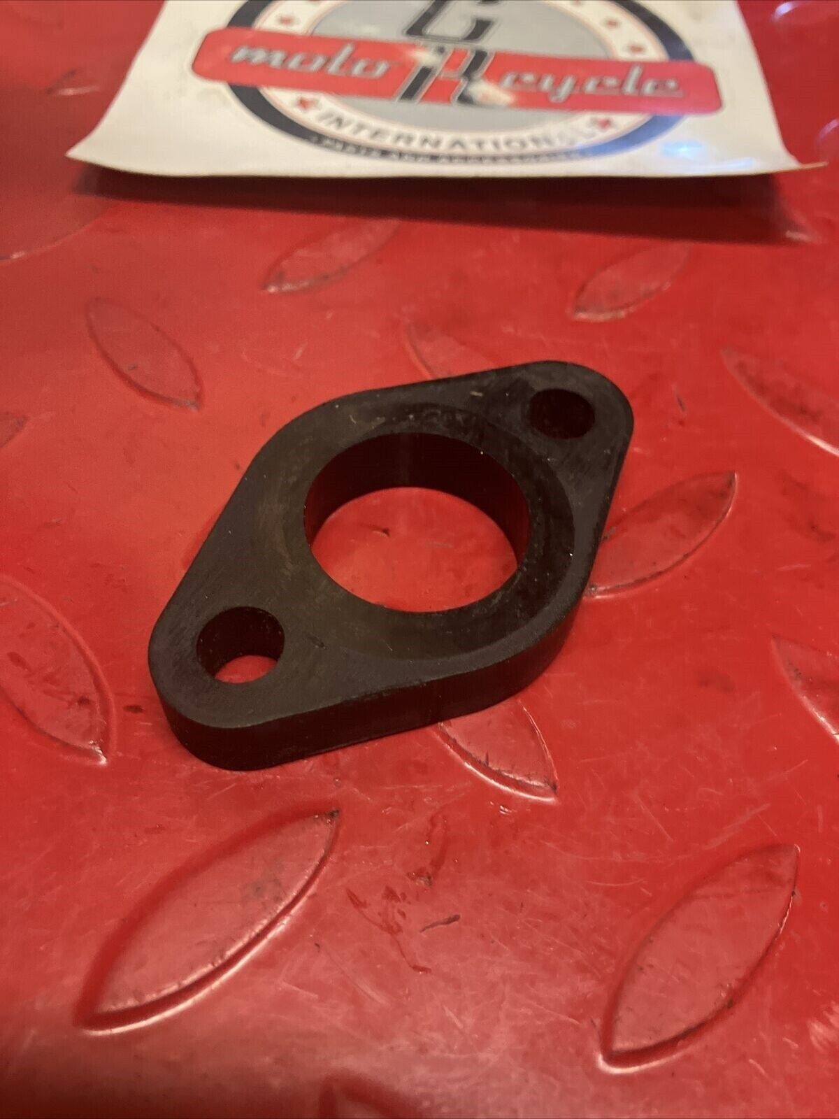 Suzuki RV125 1975 carburetor insulator intake manifold