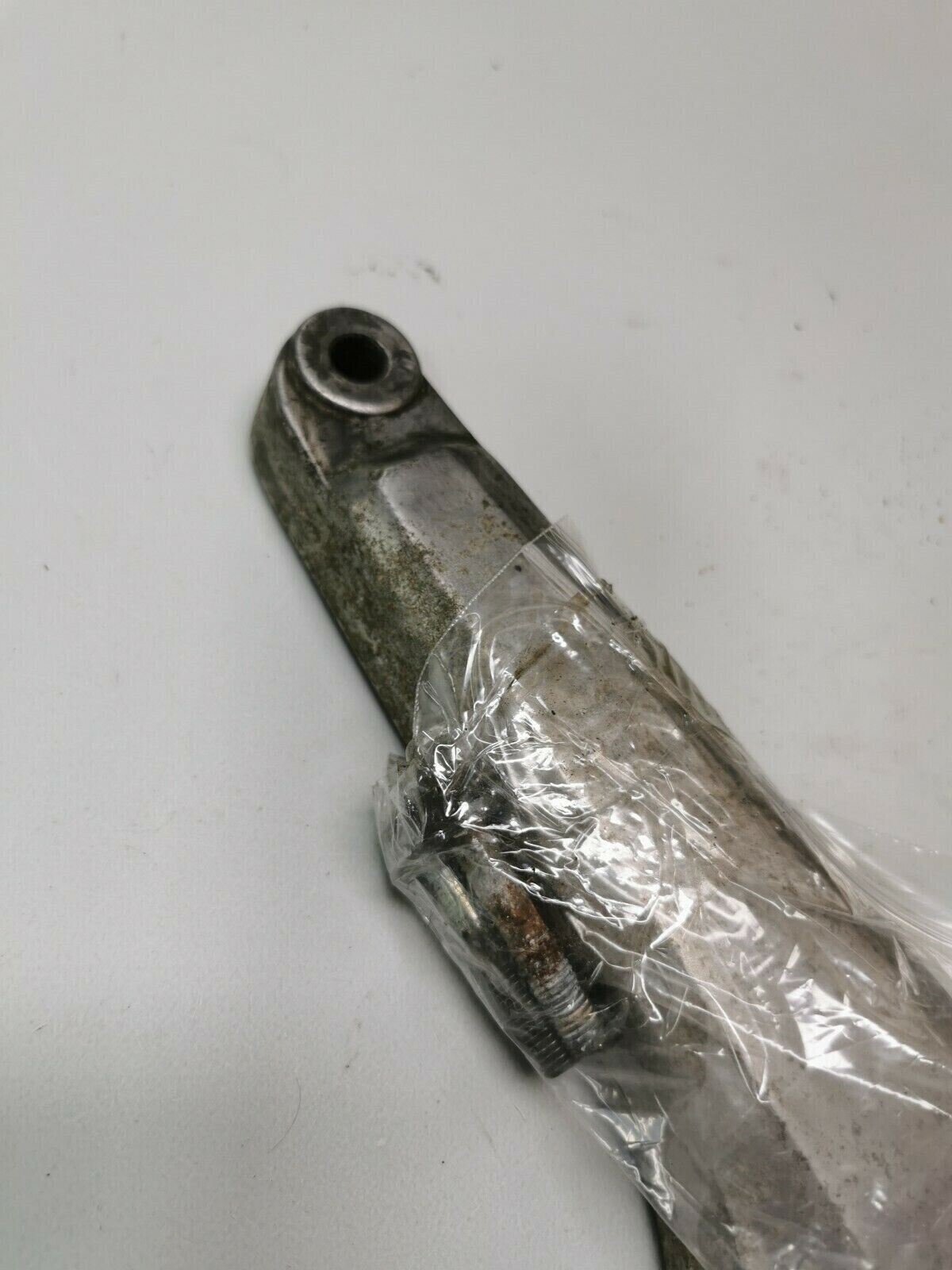 Honda CB750F 1978 left muffler holder rear footpeg foot peg bracket 1977