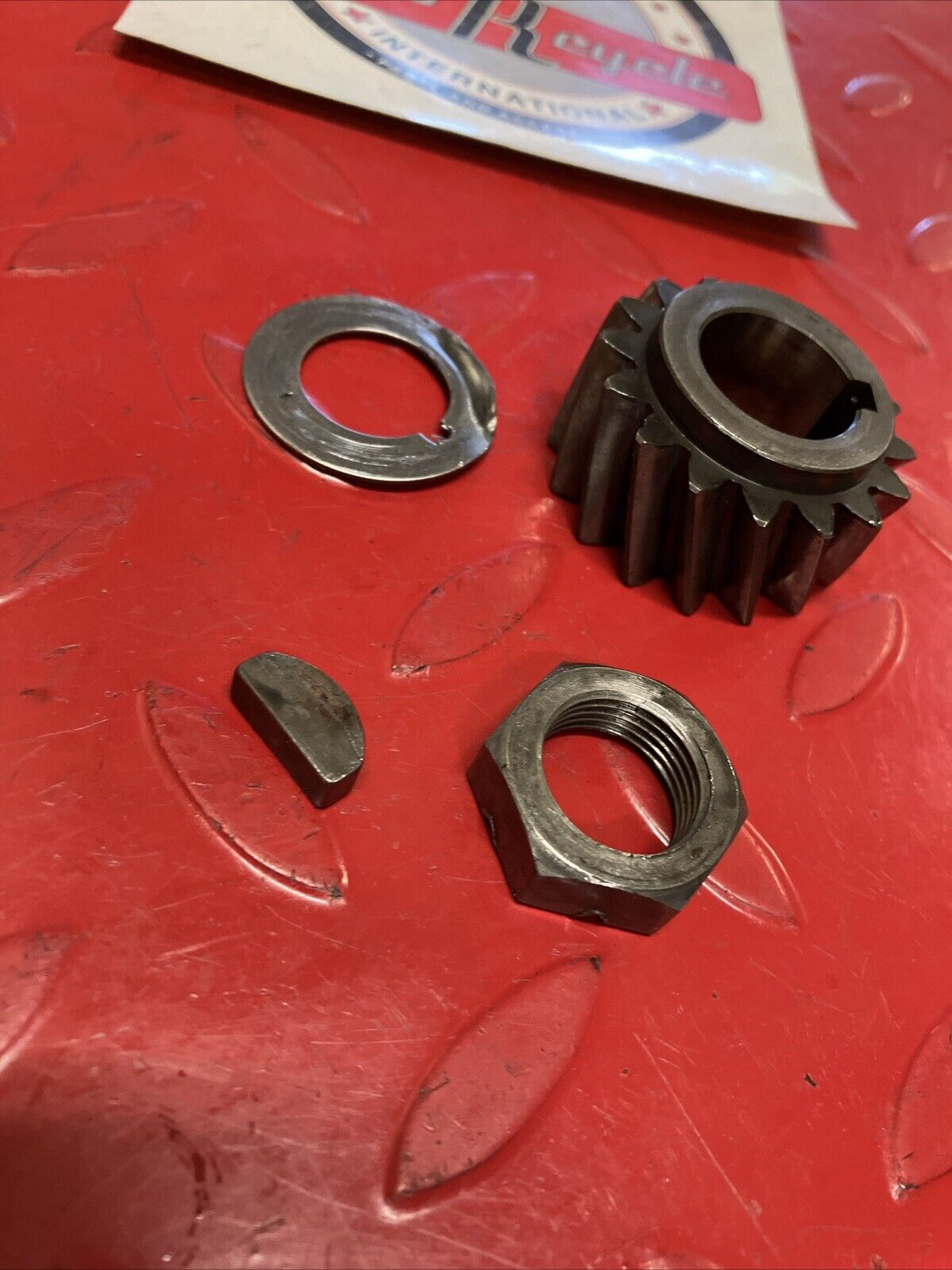 Suzuki TC125 1975 primary drive gear nut washer