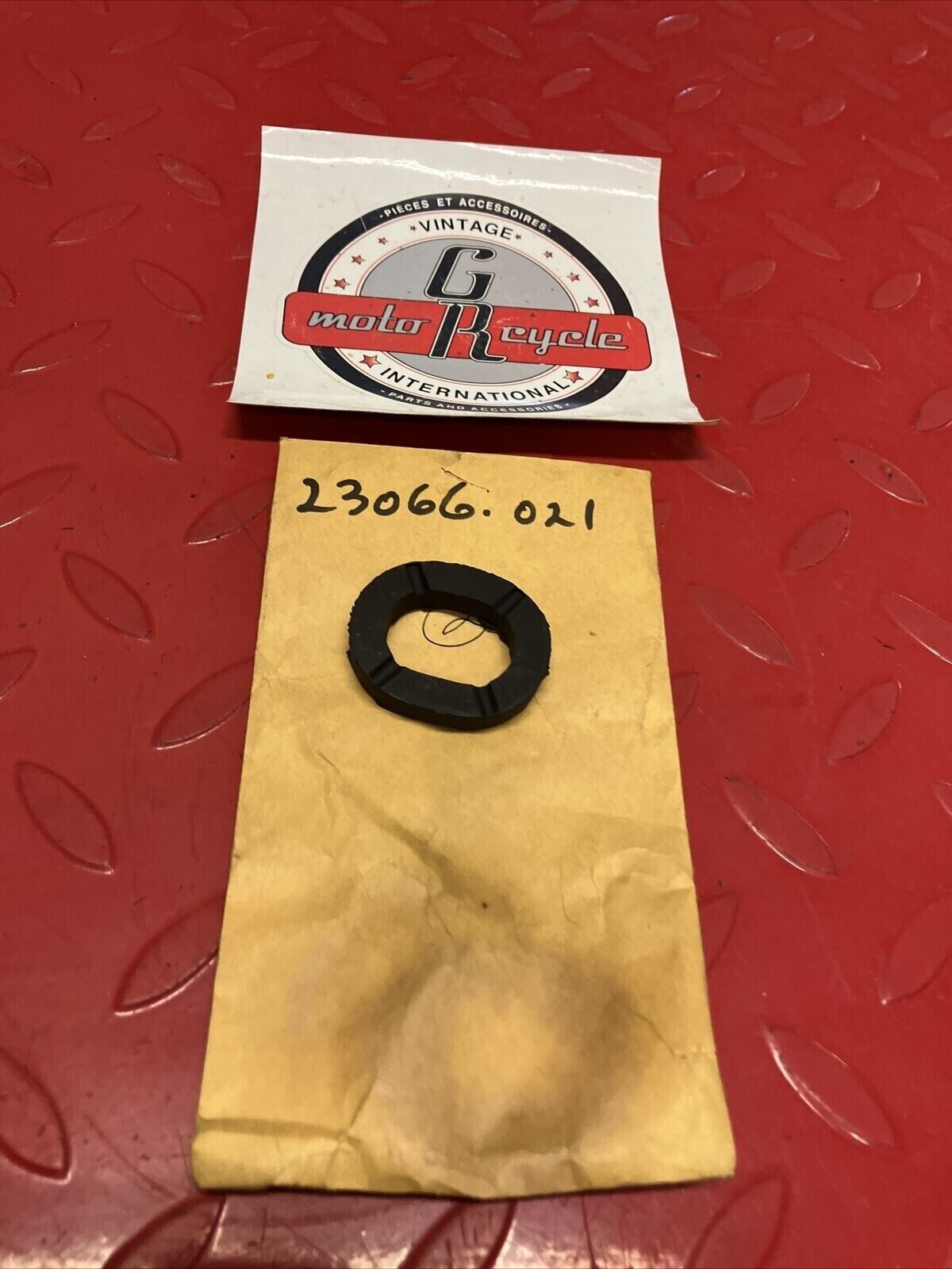 NOS KAWASAKI HEADLIGHT DAMPER RUBBER 23066-021 K19