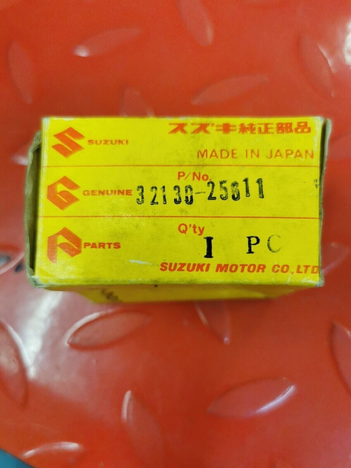 NOS SUZUKI TC100 1973 - 1975  COIL LIGHTING B  32130-25611 S12