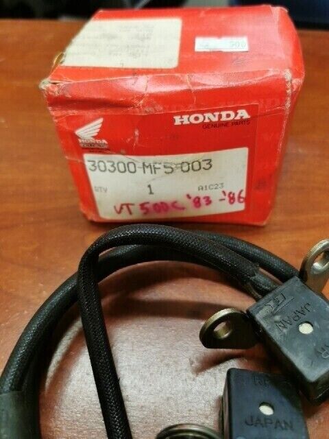 NOS Honda VT500 PULSE GENERATOR 30300-MF5-003 H97