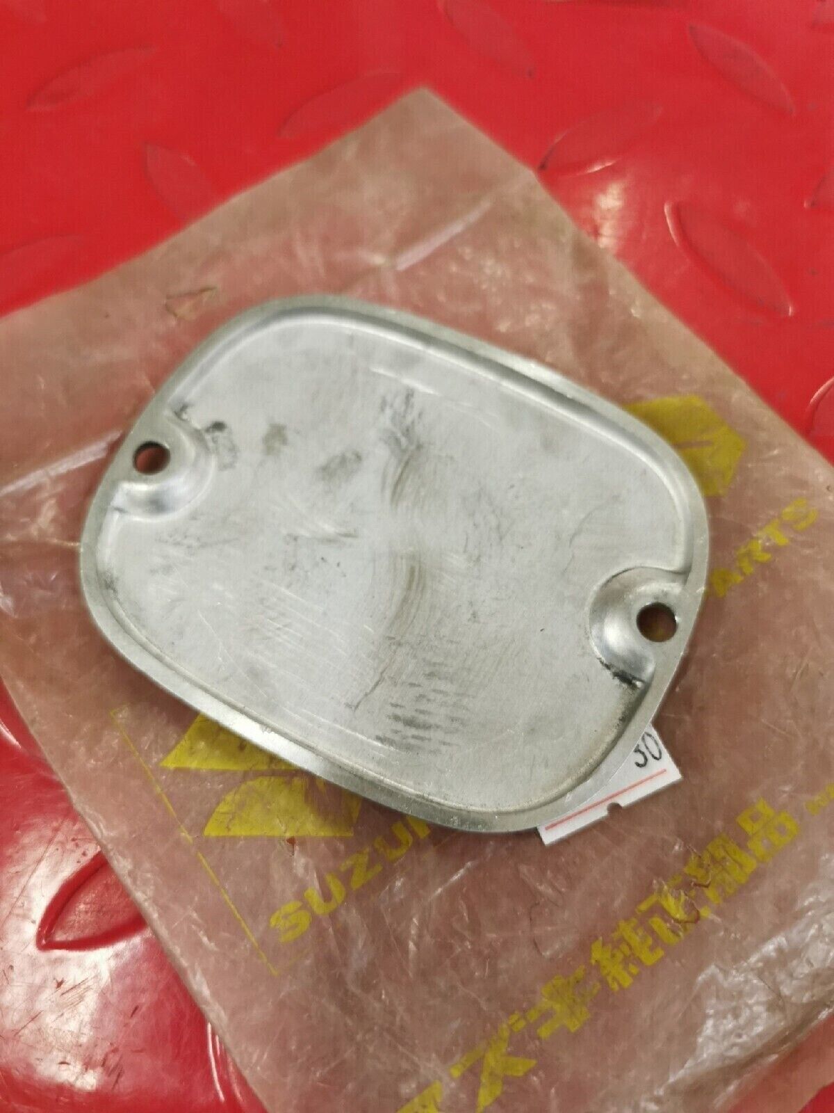 NOS SUZUKI TC120 1971 REDUCTION ARM COVER 11388-07401 S12