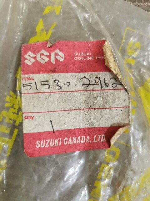 NOS SUZUKI TC125 1973 - 1977 TC185 BRACKET HEADLAMP HOUSING 51530-29621 S55