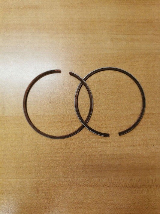 NOS SUZUKI RM250 1976 PISTON RING SET .25 12140-40700 S8