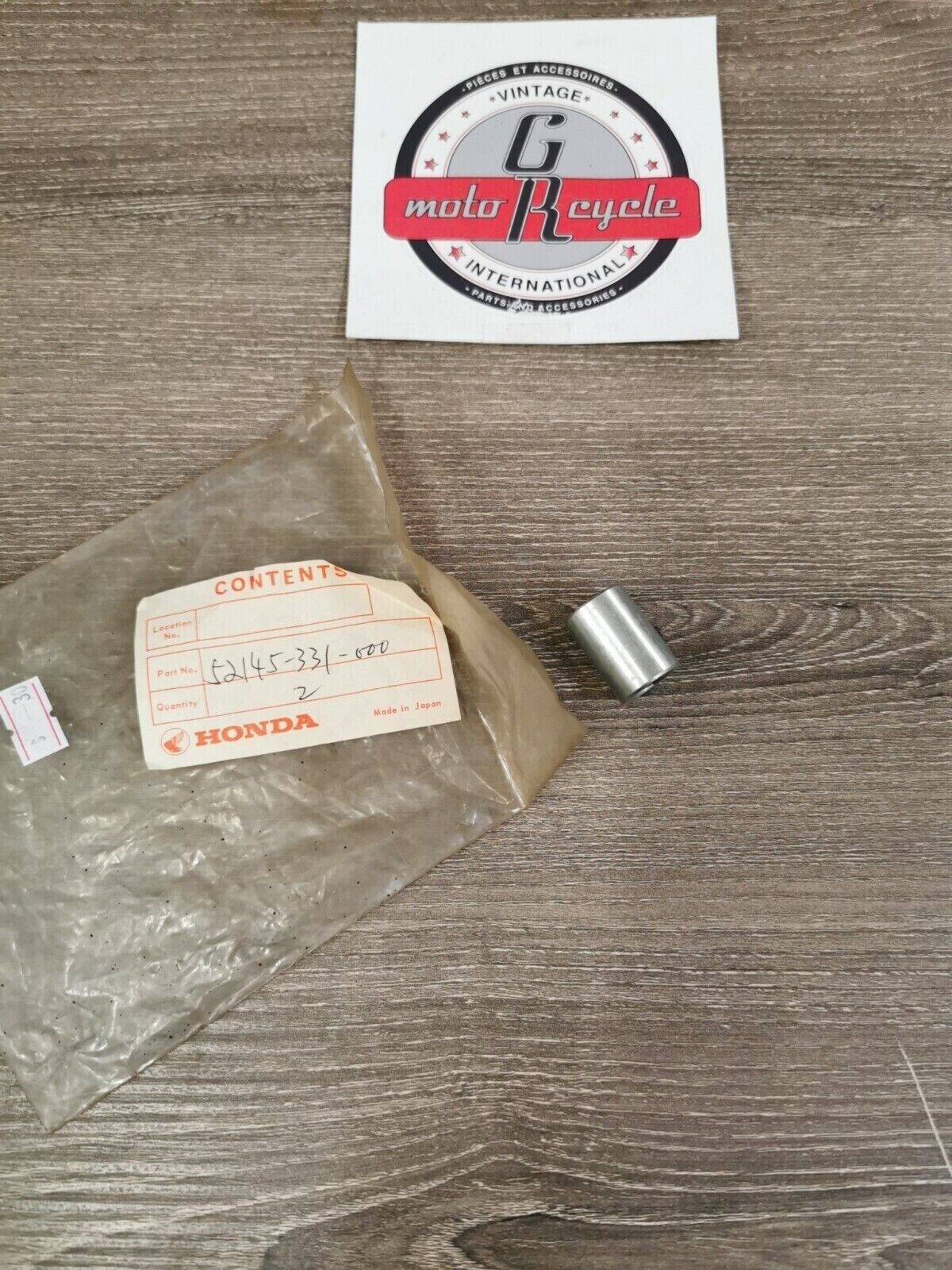 NOS HONDA SL100 1973 XL100 COLLAR RR SWINGARM PIVOT BOLT 52145-331-000 H48