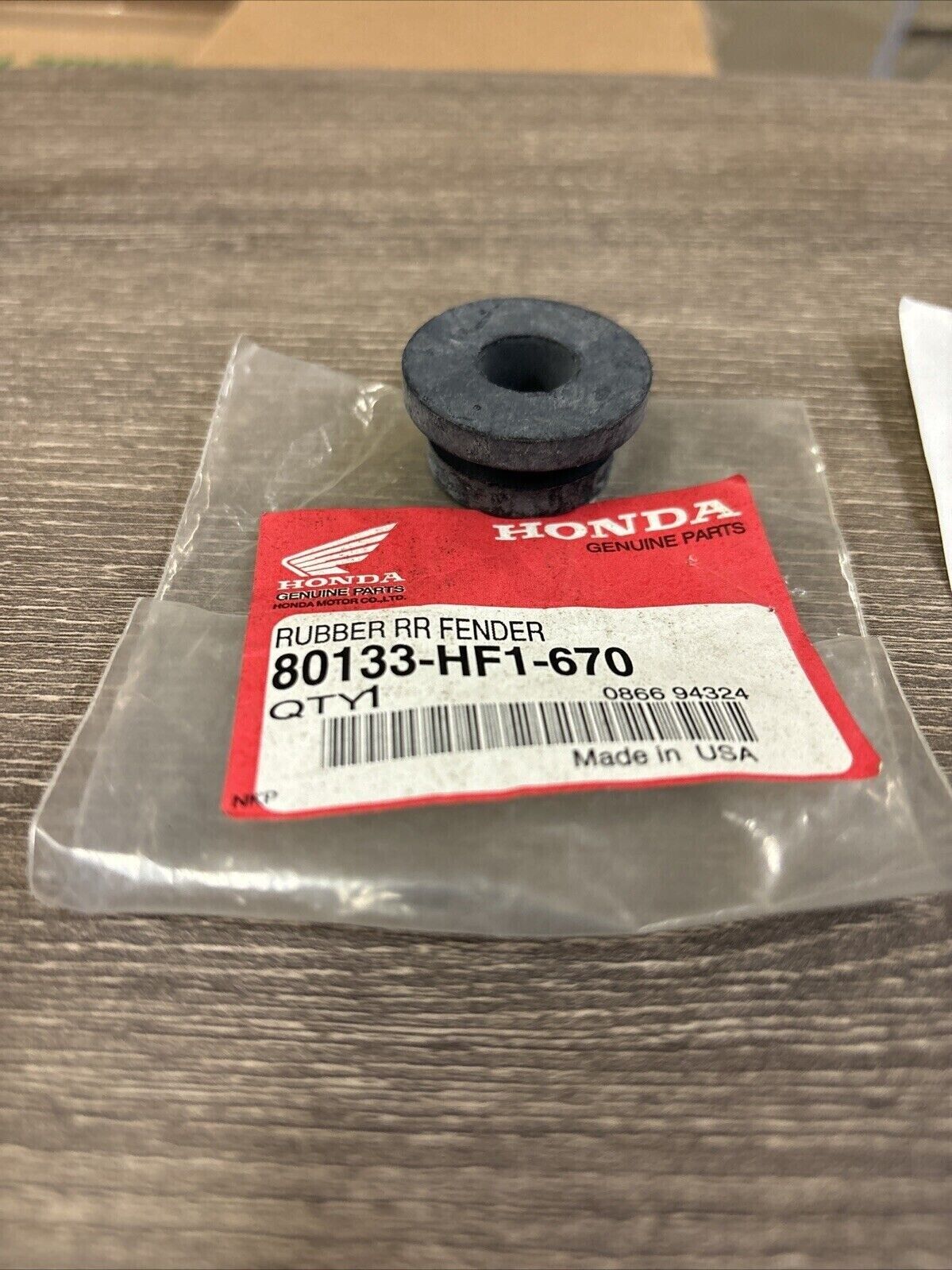 NOS Honda TRX200 TRX200D REAR FENDER RUBBER 80133-HF1-670 H123