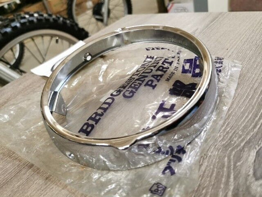 NOS BRIDGESTONE HEADLIGHT RIM 6" 1143 B1