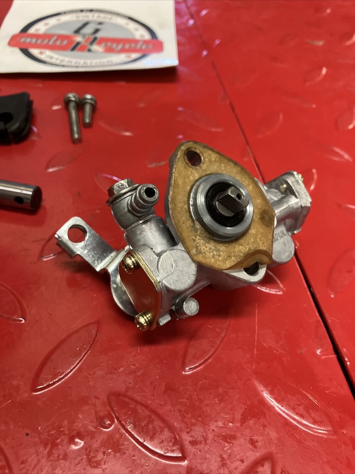 Suzuki DS100 1978 oil pump assembly gear cover shaft