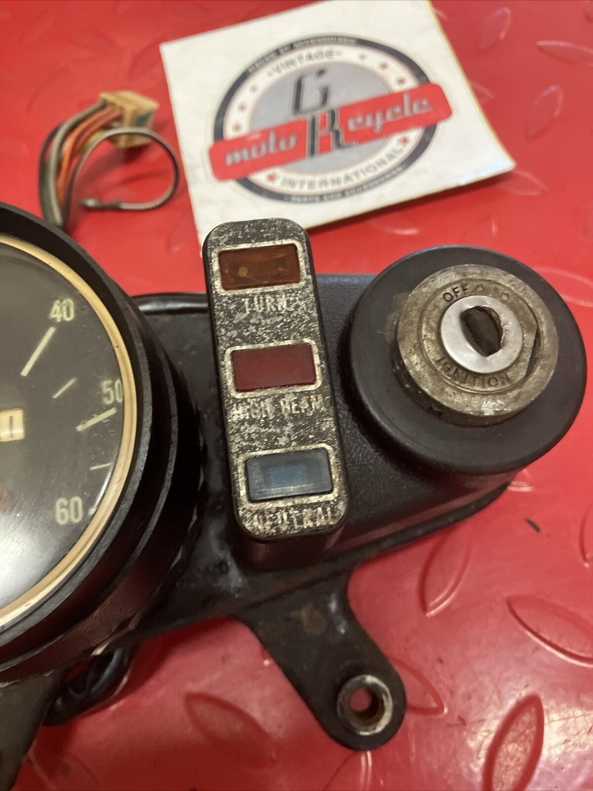 Suzuki RV90 1975 speedometer pilot lamp bracket ignition switch assembly