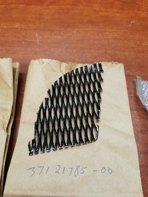 NOS Yamaha 1973 TX500 LEFT SIDE COVER NET, MOLD AND EMBLEM KIT Y128