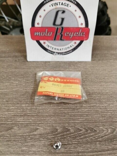 NOS SUZUKI GS750L GS550L GS1000L AC50 GN250 GN125E NUT 08313-11057 S36