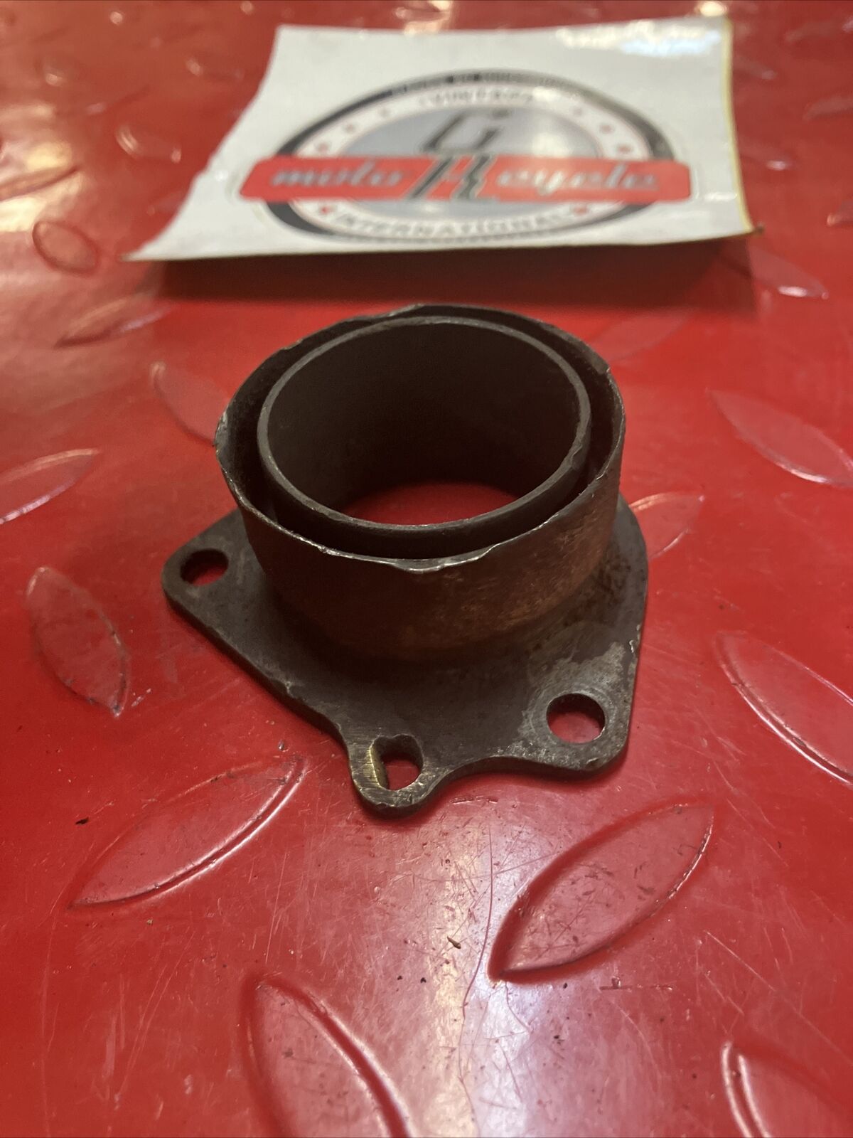 Suzuki RM125 1982 exhaust manifold pipe header flange holder 1981 1983 2
