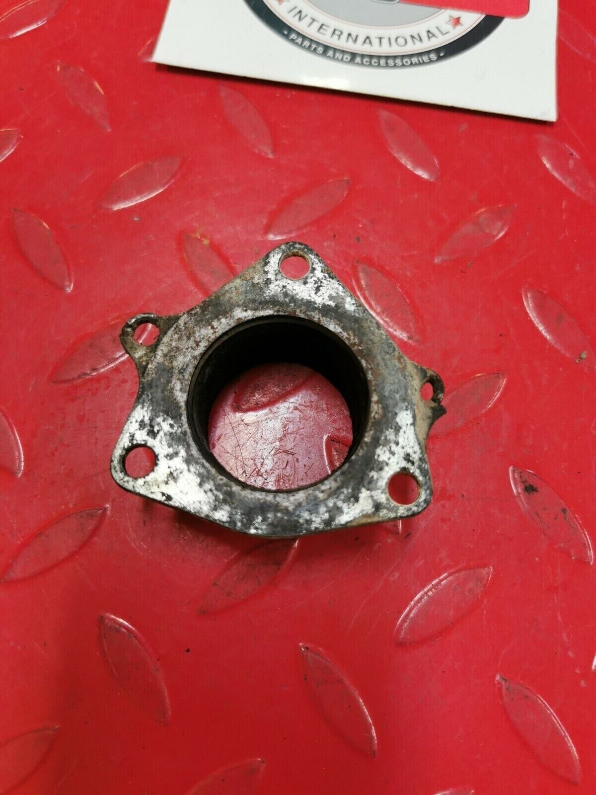 Suzuki RM125 1982 exhaust manifold pipe header flange holder 1981 1983