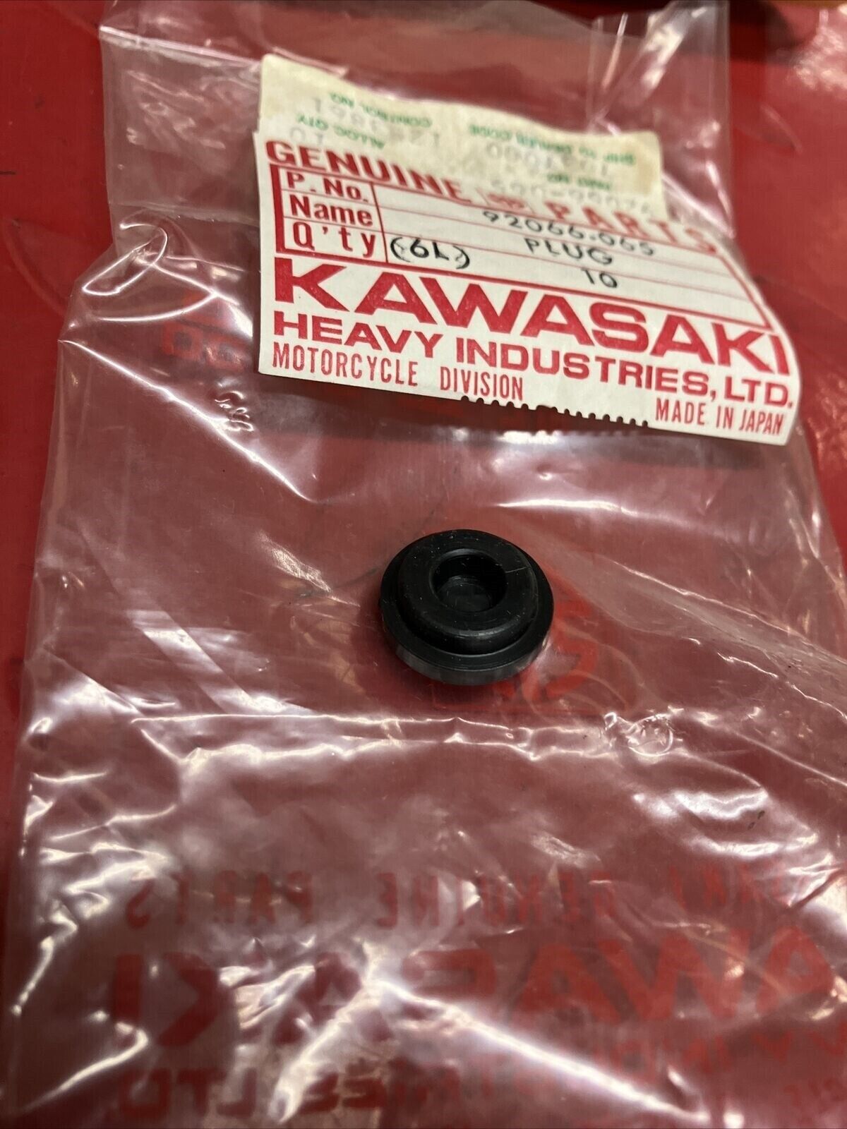 NOS KAWASAKI PLUG 92066-065 K18