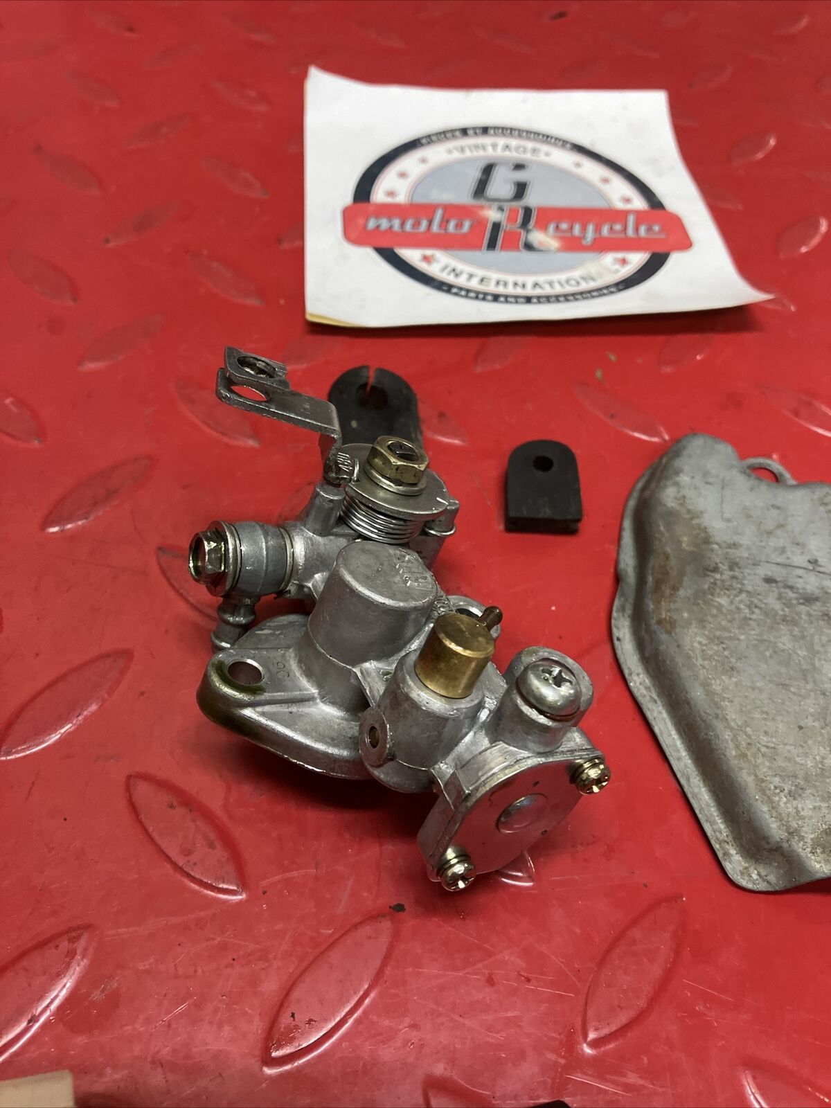 Suzuki DS100 1980 oil pump assembly gear cover shaft