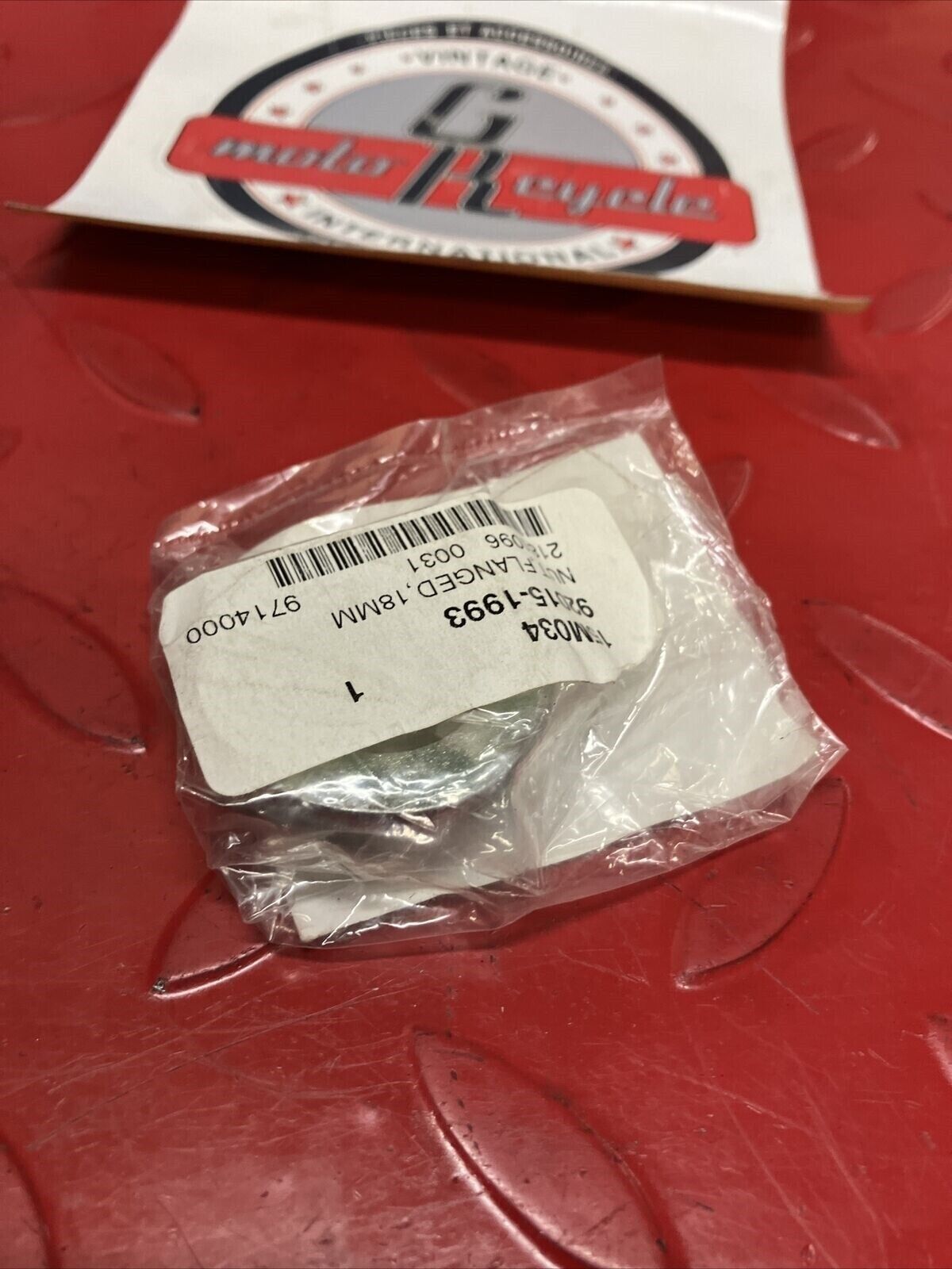 NOS KAWASAKI FLANGED NUT 18MM 92015-1993 K13