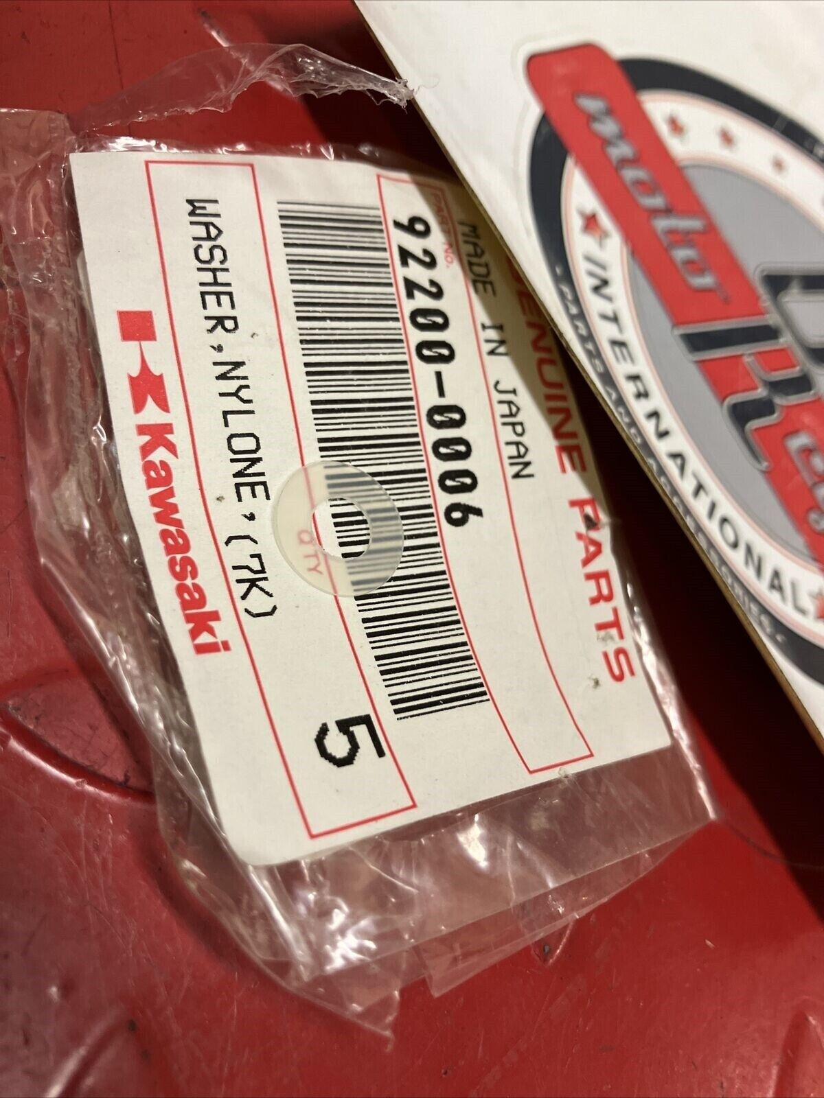 NOS KAWASAKI WASHER NYLONE 5.3x11.5x0.5 92200-0006 K13