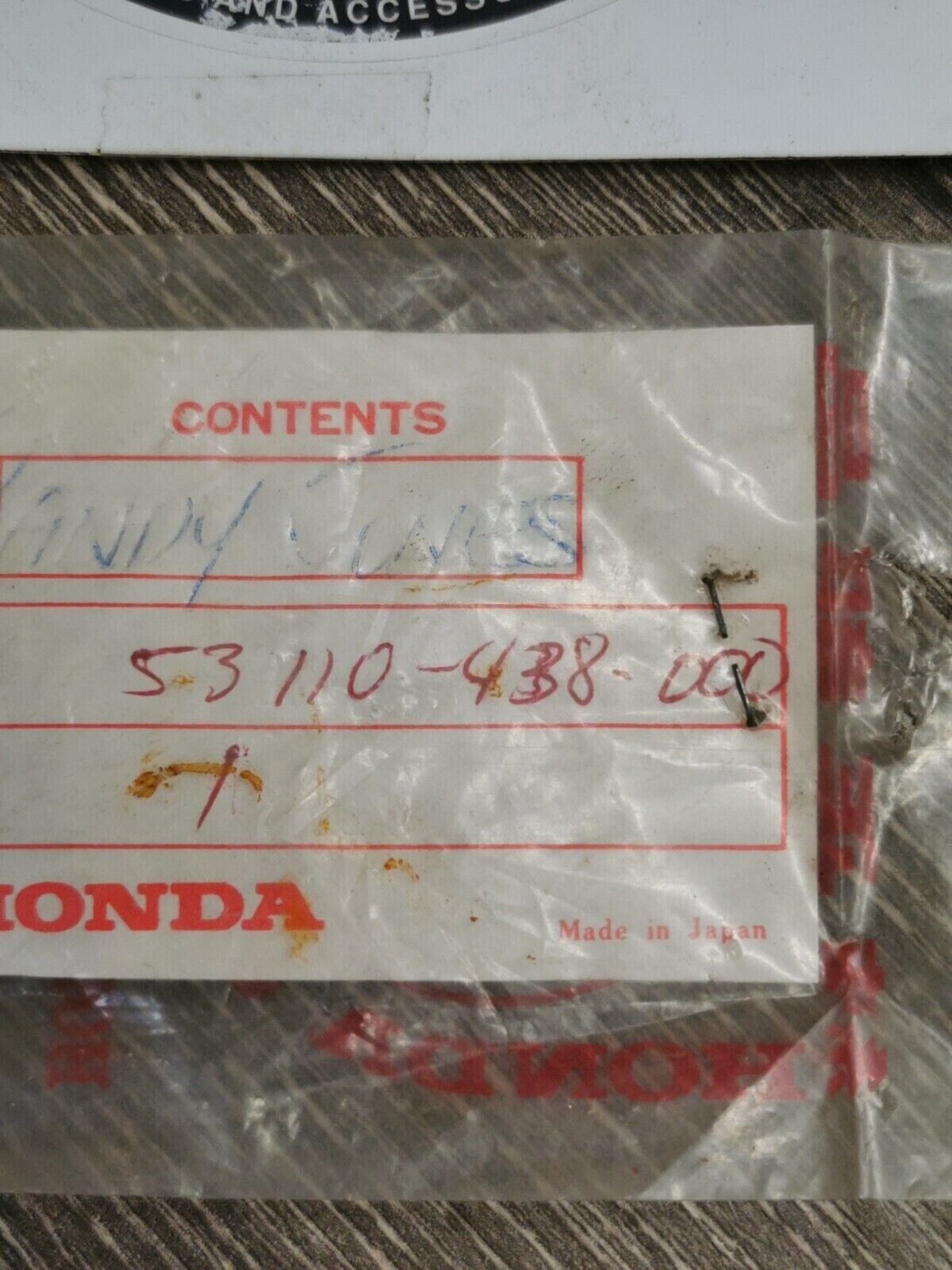 NOS HONDA PLUG HANDL WEIGHT 53110-438-000 H54