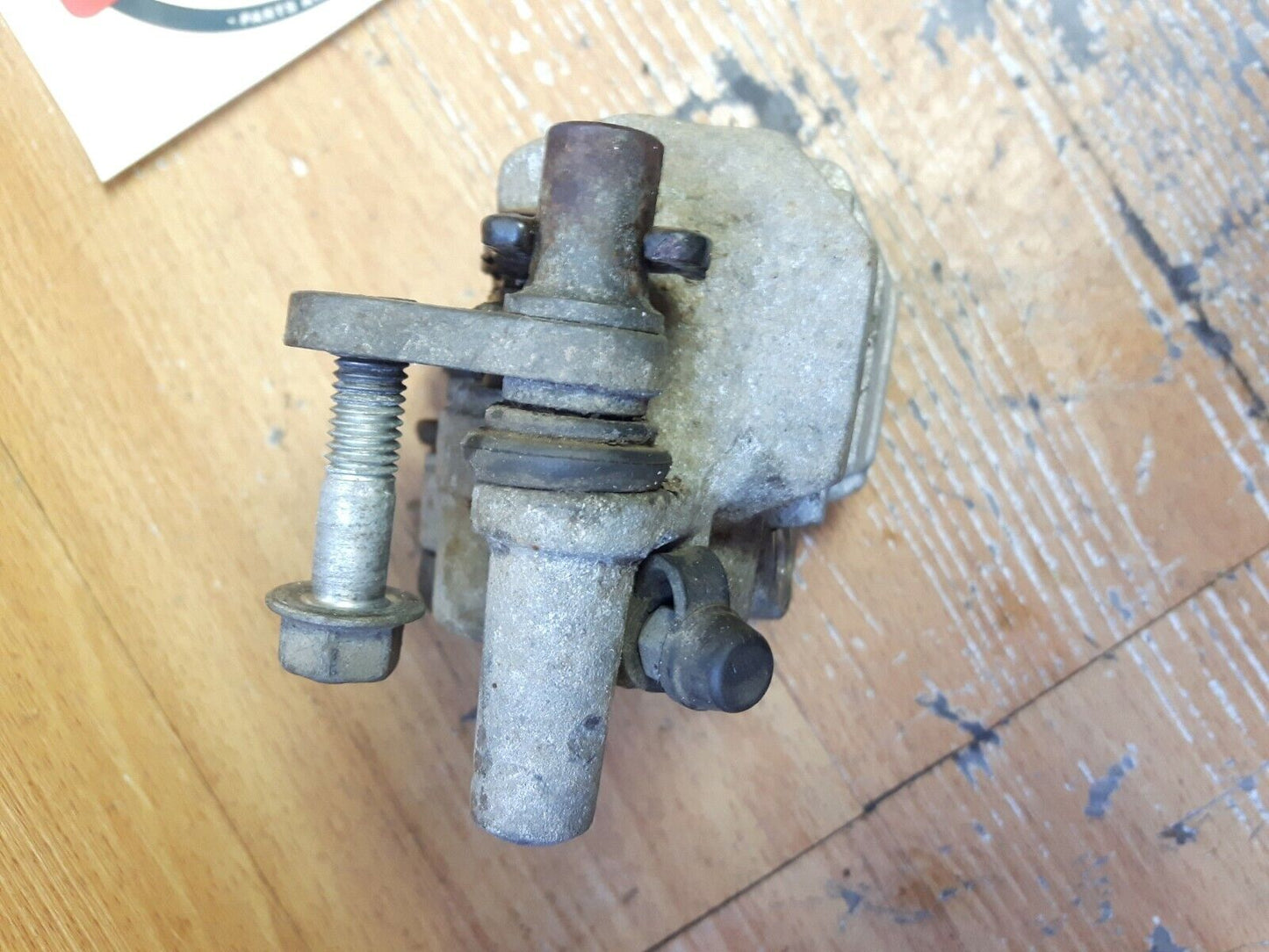 Suzuki RM250 1990 front brake caliper