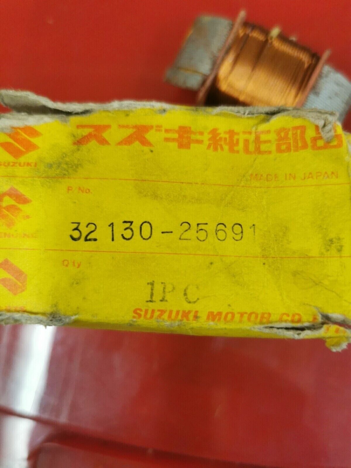 NOS SUZUKI TC100 COIL  LIGHTING A  32130-25691 S23