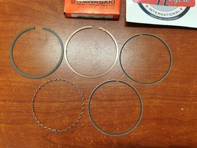 NOS Kawasaki 1987 1988 KLF300 PISTON RING SET (O/S 1.00MM) 13024-1064 K38