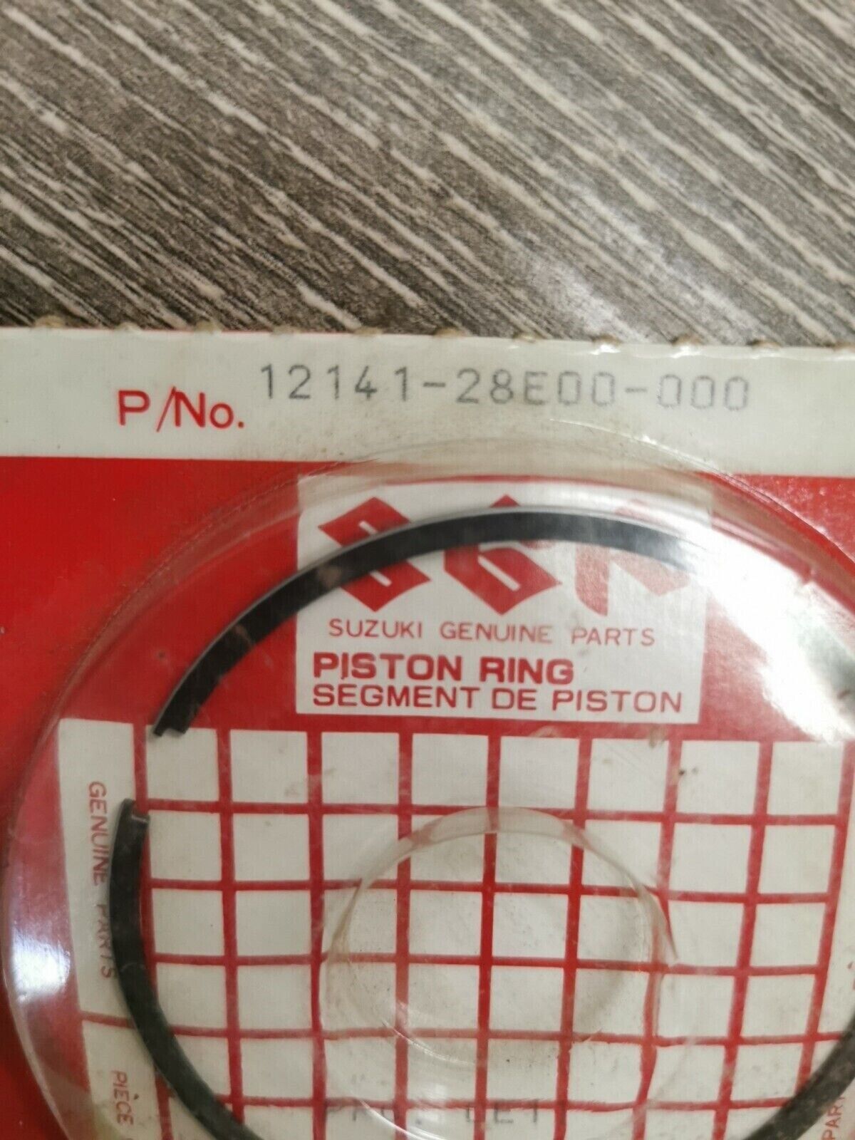 NOS SUZUKI RM250 RMX250T 1989 - 1998 PISTON RING 12141-28E00 S24