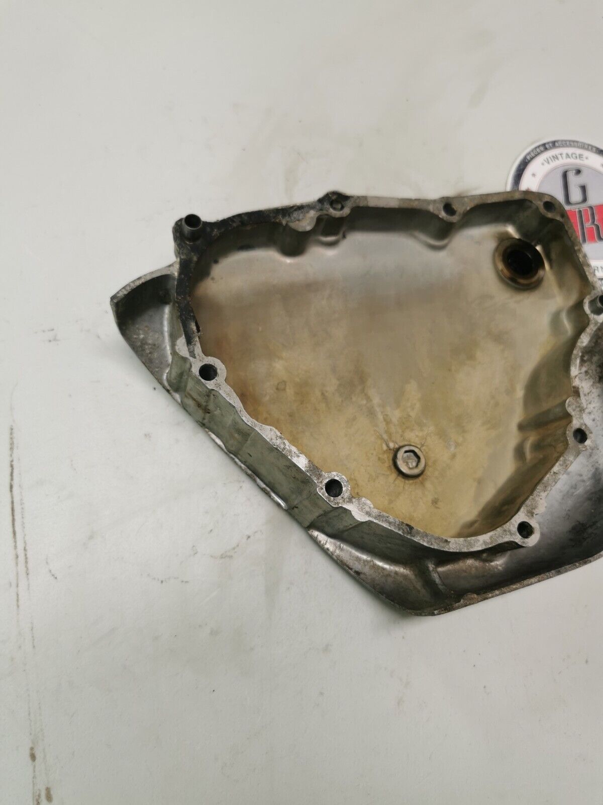 Honda CB750K 1974 left crankcase transmission front sprocket cover 11360-300-040