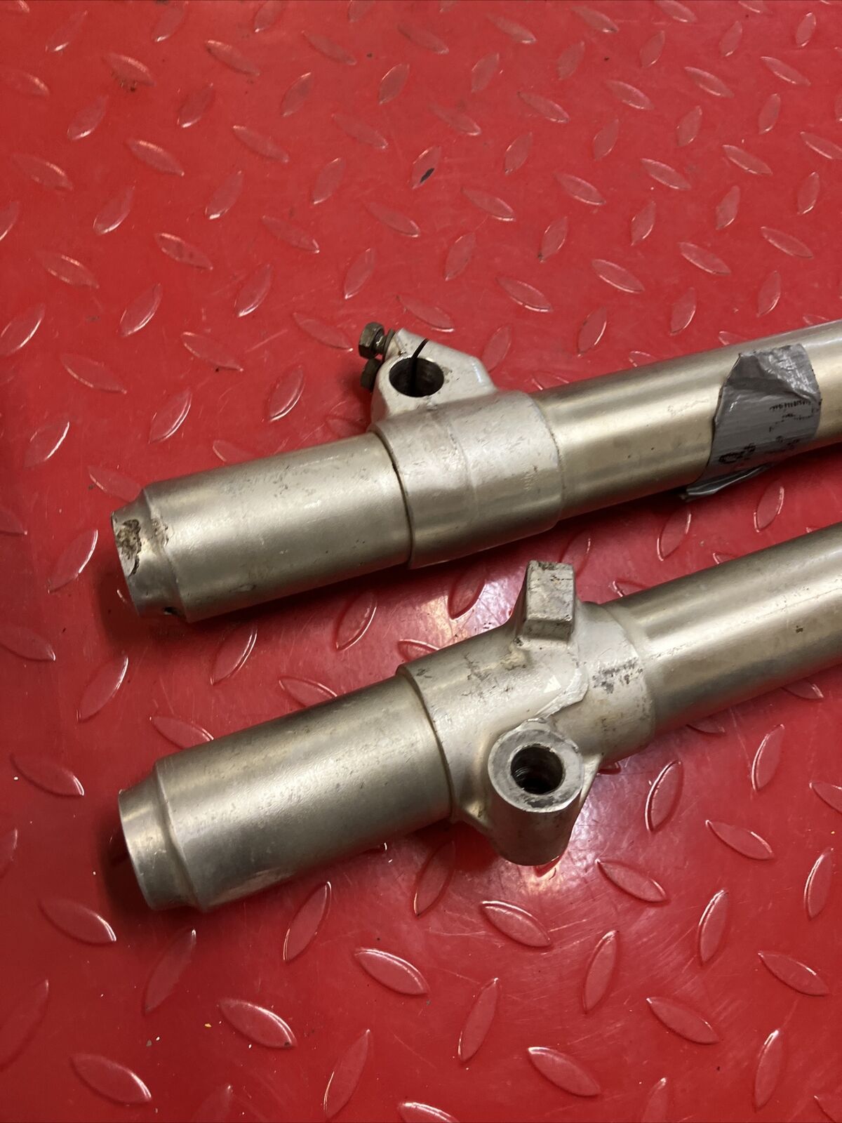 Suzuki RM125 1984 left right front forks