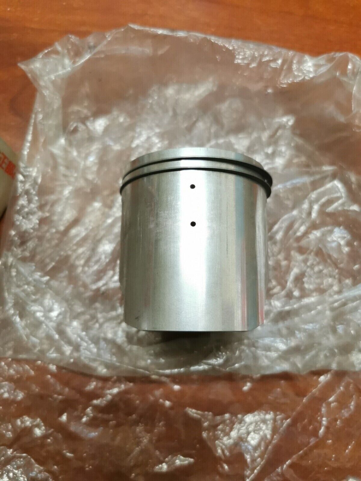 NOS SUZUKI 1985 1986 RM125 PISTON RING KIT 12103-14850-050 - 12110-14513-050 S30