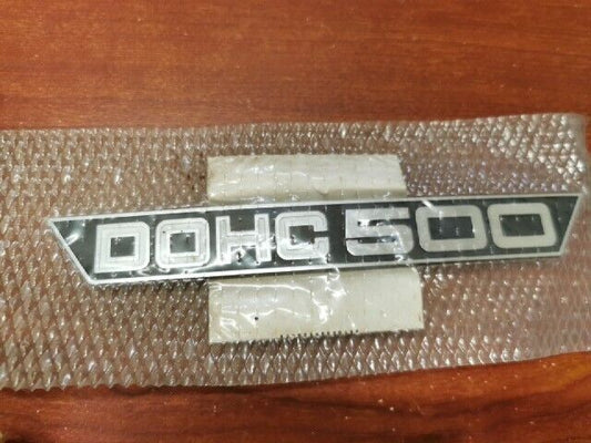 NOS Yamaha 1973 TX500 LEFT SIDE COVER NET, MOLD AND EMBLEM KIT Y128